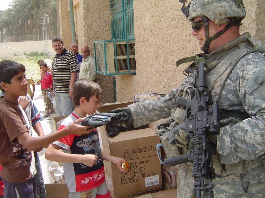 Operation Homerun-soldiers distribute equipment.JPG